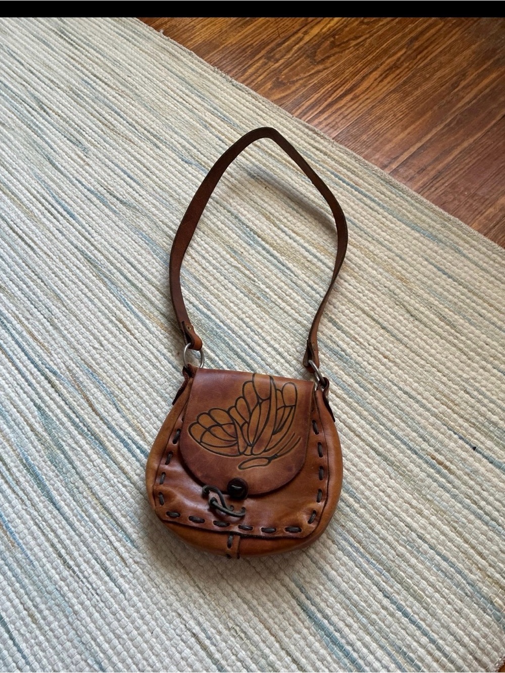 Handcrafted Brown Leather Crossbody Bag with Floral Motif